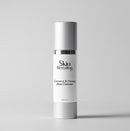 Skincare bottle labeled 'Skin Revealing Coconut & Honey Aloe Cleanser' on a light gray background