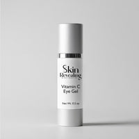 Vitamin C eye gel bottle on a gray background
